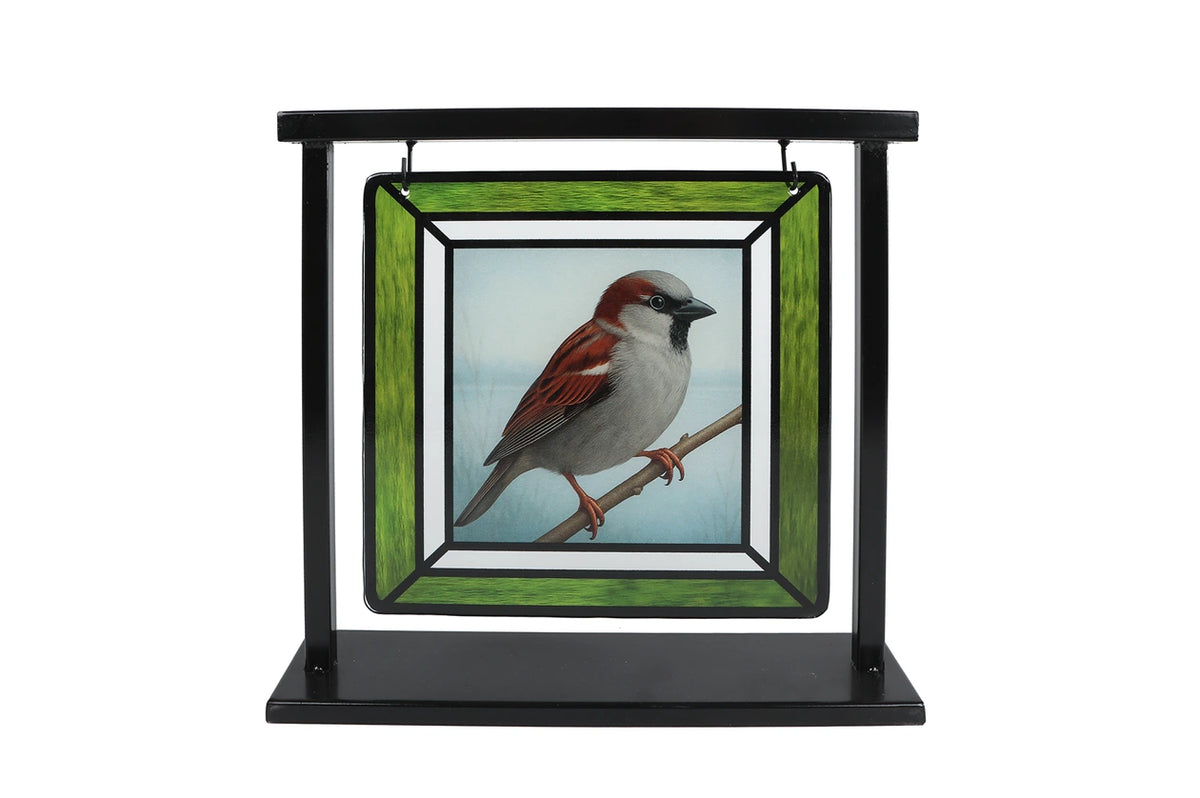 Suncatcher mus in zwarte standaard op witte achtergrond
